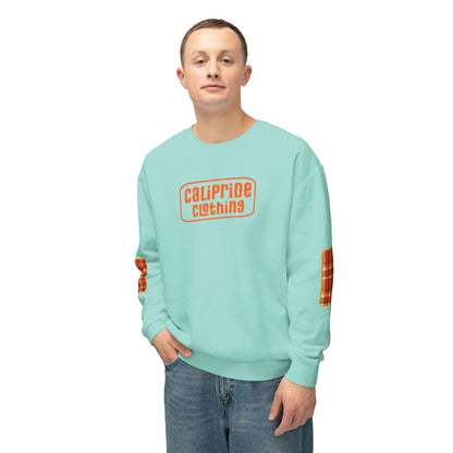Pacific Plaid Crew, A man wearing a Chalky Mint color crewneck sweatshirt with an orange 'CaliPride Clothing' logo on the chest and orange plaid patches on the sleeves, .